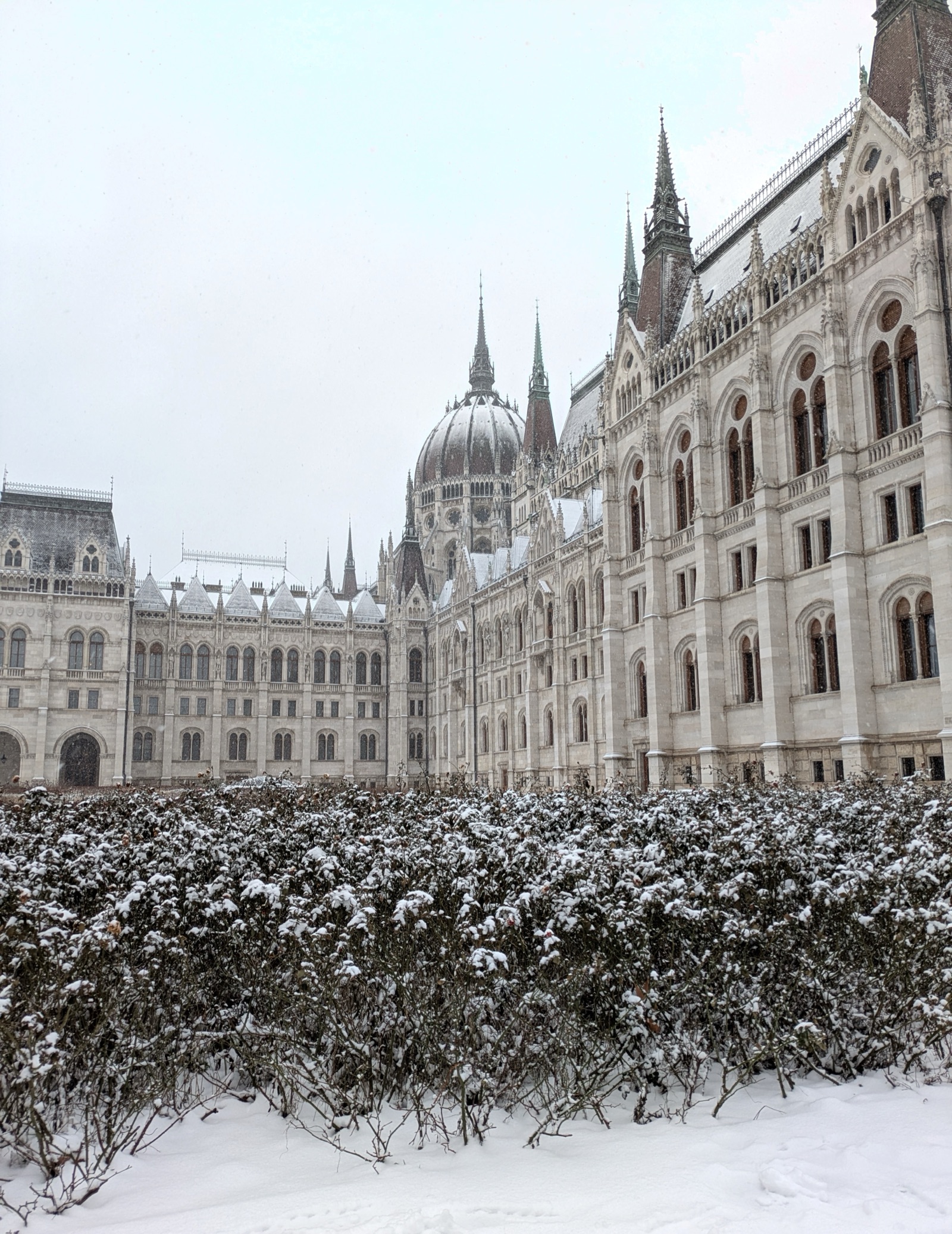Hungarian Parliament Building with snow (shot from Pest)